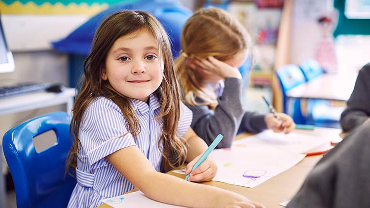 Girl in school benefiting from an education savings account.